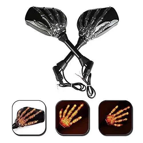 Espejo retrovisor iluminado de la mano del cráneo retro